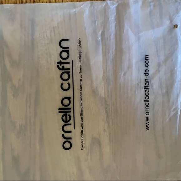 Coverup - Picture 2 of 2